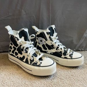 Cow print high top platform converse